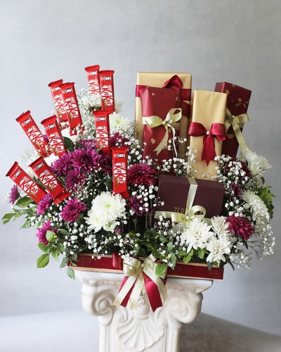 Deluxe Quality Flowers and Chocolates